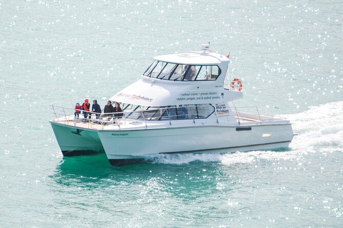 Akaroa Dolphins ~ Harbour Nature Cruise - Stop 1: Akaroa Lighthouse and the harbour entrance