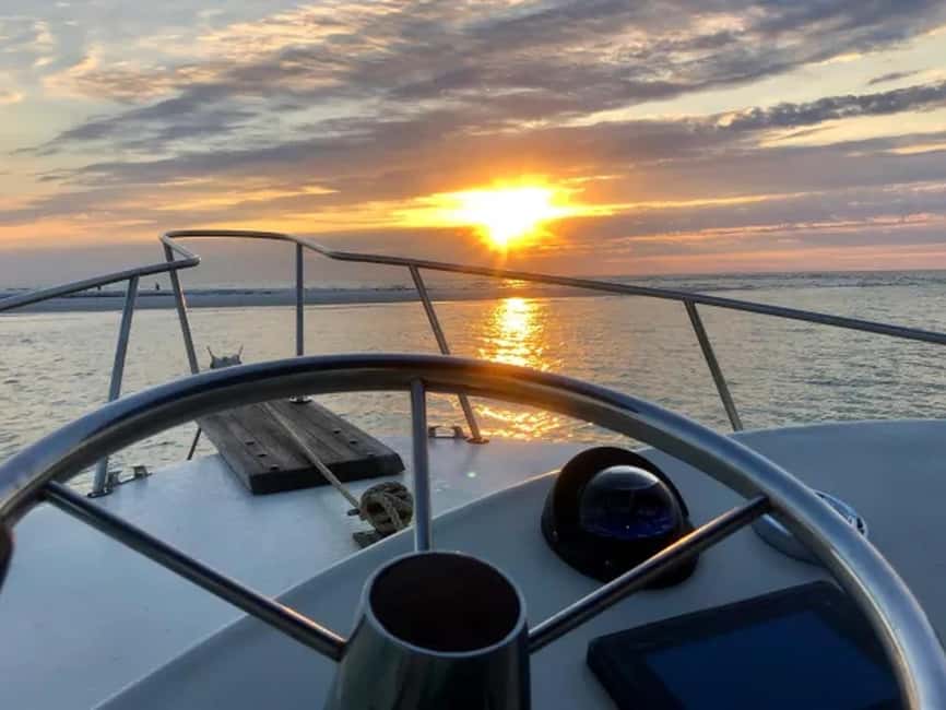 Anna Maria Island: Sunset Dolphin Cruise - Captains and crew shape the experience