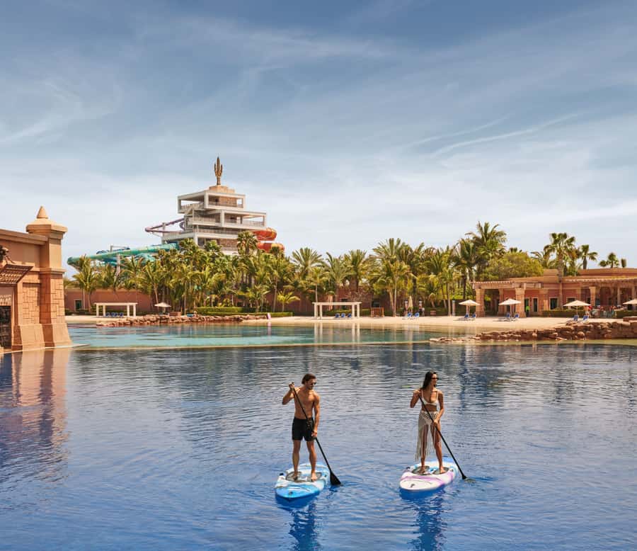 Aquaventure World: Dolphin Paddle and Waterpark Day Pass - Meeting dolphins at Atlas Village