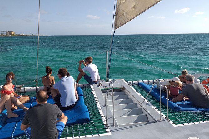 Aruba Sunset Sail Cruise Aboard The Dolphin Catamaran - The swim stop, rope swing, and water slide