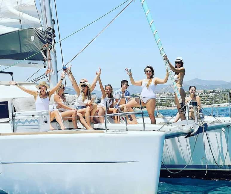 Benalmádena: Sailing & Dolphin Watching with Snacks/Drinks - The calm-water stop for swimming and paddleboarding
