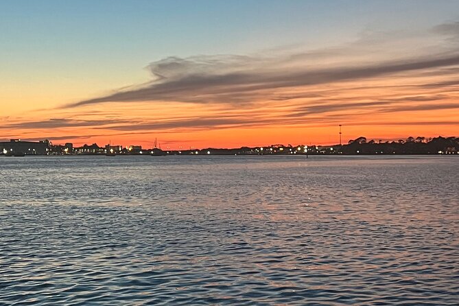 Big Kahuna Sunset Dolphin Cruise Experience - Following Dolphins Along the Emerald Coast