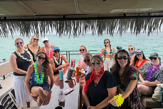 Big Kahuna Sunset Dolphin Cruise Experience - Captain John, Captain Angie, and Captain Lyric