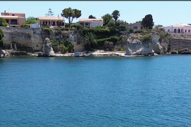 Boat tour with dolphin sighting - Entering Syracuse’s coastal caves