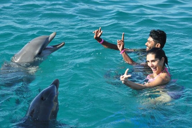 Catamaran Cruise to Ile Aux Bénitiers: Dolphin watch, Crystal Rock & Transfer - Crystal Rock, reef water, and mountain views