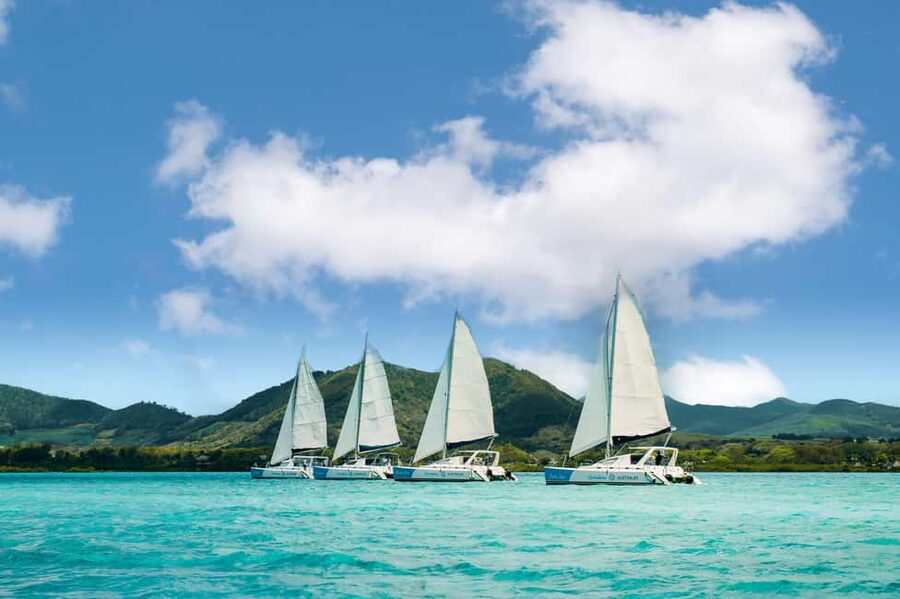Catamaran Cruise to île aux Cerfs w Dolphins watch & Lunch - Starting beside the Mauritian flag