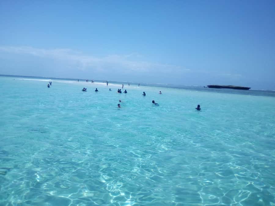 Diani: Wasini Island Dolphin Watching and Snorkeling Tour - Boarding the Arabic dhow at Shimoni