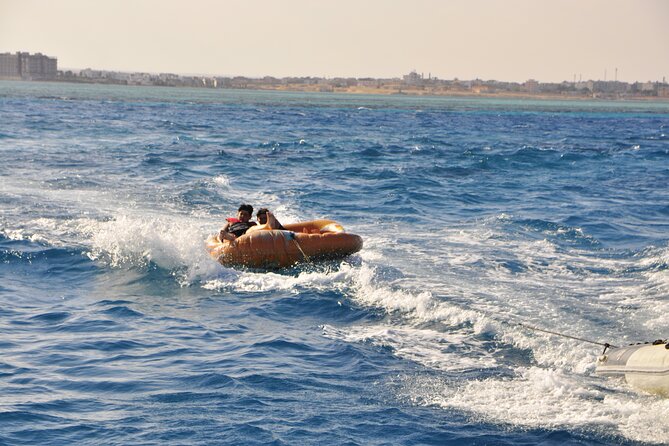 Dolphin House Cruise with water sports and Lunch in Hurghada - Two snorkeling stops, with equipment supplied