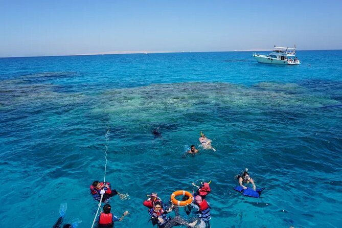 Dolphin house Snorkeling trip with Banan & Sofa Boat in Hurghada - Searching for dolphins in open water