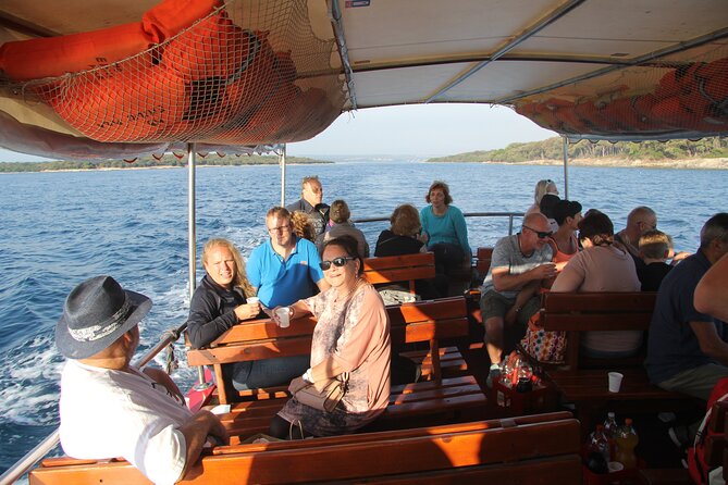 Dolphin Watching Sunset Boat Trip in Pula with Dinner - Crew, atmosphere, and group size