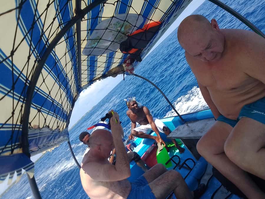 Dolphins & Snorkeling Zanzibar: Mnemba Island Tour - Fruit, water, and time to rest