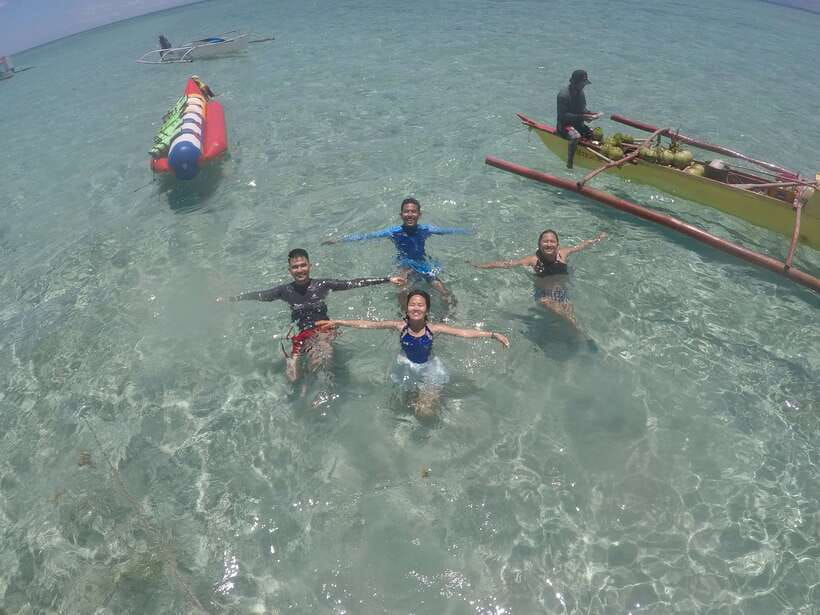 Dumaguete: Dolphin Watching & Manjuyod Sandbar Private Tour - Swimming and Snorkeling in Clear Bais Bay Water
