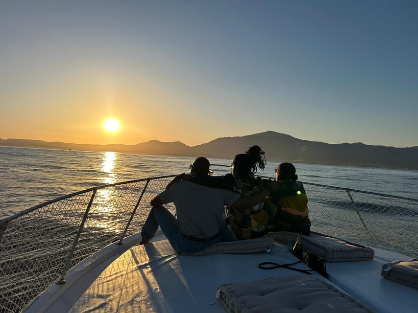 Estepona: Dolphin Searching Sunset Cruise with Drink & Snack - A small boat setting with room to relax