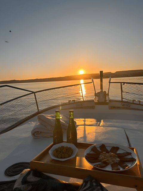 Estepona: Dolphin Searching Sunset Cruise with Drink & Snack - What the crew adds to the experience