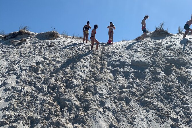 Frisky Mermaid Dolphin Tour + Secluded Beach + Equip - Dolphins, family time, and a quiet beach