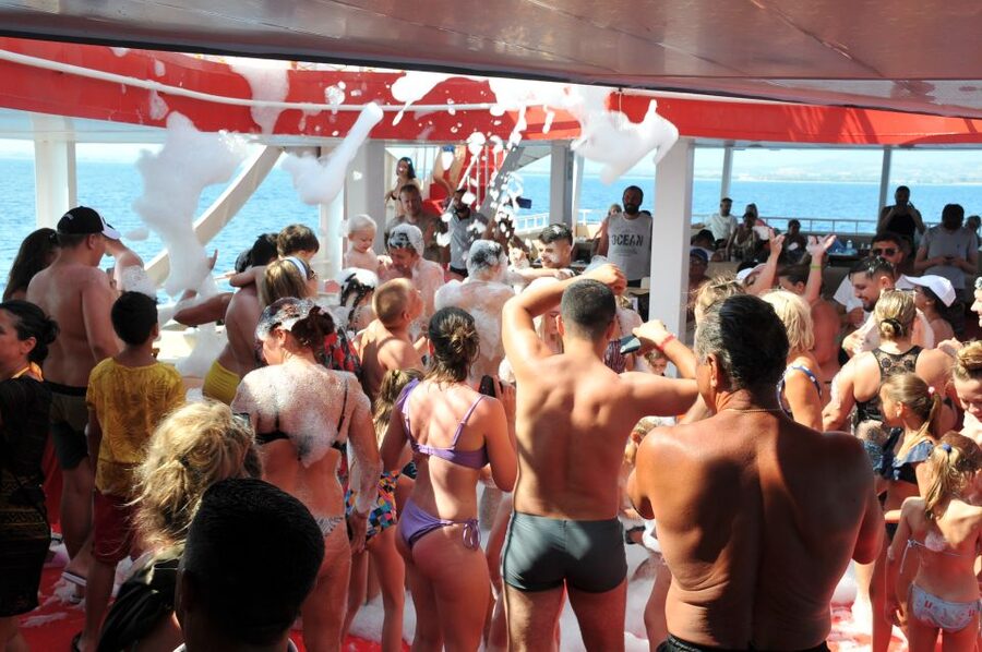 From City of Side: Dolphins Island Boat Trip with Transfer - The atmosphere: calm cruise with occasional entertainment