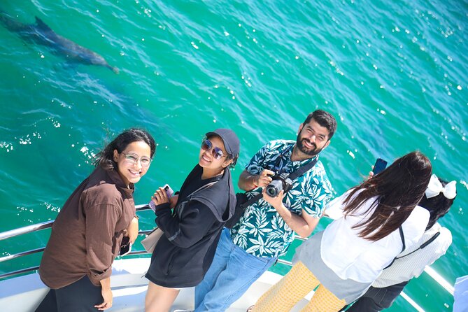 From Sydney: Port Stephens Dolphin, Koalas, Lunch & Sandboarding - How the price works at $142.01