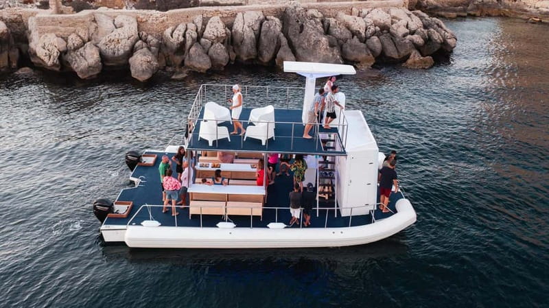 Giardini Naxos: Dolphin Catamaran Sunset Tour with Aperetif - The Ancient Naxos platter is part of the sightseeing
