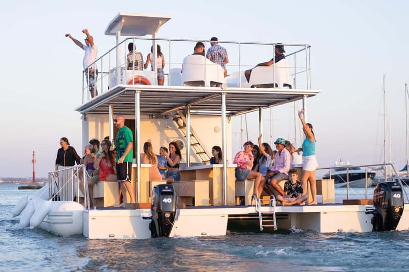 Giardini Naxos: Dolphin Catamaran Sunset Tour with Aperetif - Isola Bella, the Blue Grotto, and the Coast of Myths