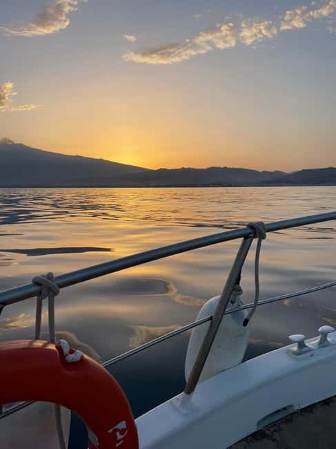 Giardini Naxos: Dolphin Searching Sunset Boat Tour - Searching for dolphins in the open sea