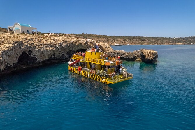 Glass Bottom Boat Dolphin Cruise to Blue Lagoon and Turtle Cove - Green Bay is the first real water stop