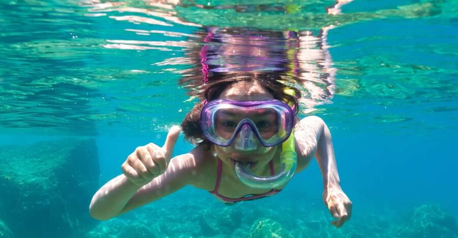 Golfo Aranci: Dolphin Watching and Snorkeling Boat Tour - Setting out from Sos Aranzos toward Cape Figari