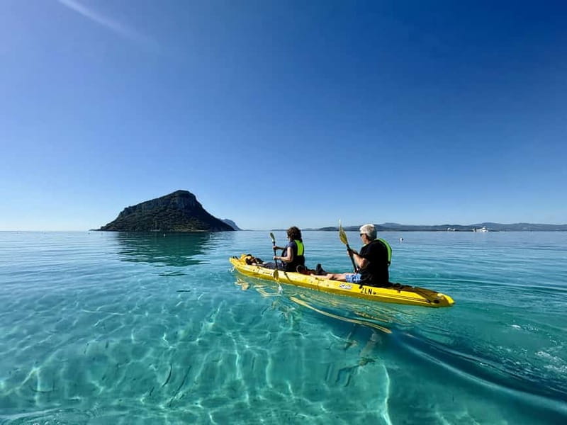 Golfo Aranci:Small group, german guided Kayak tour&Dolphins - Starting at the yellow kayaks in Golfo Aranci