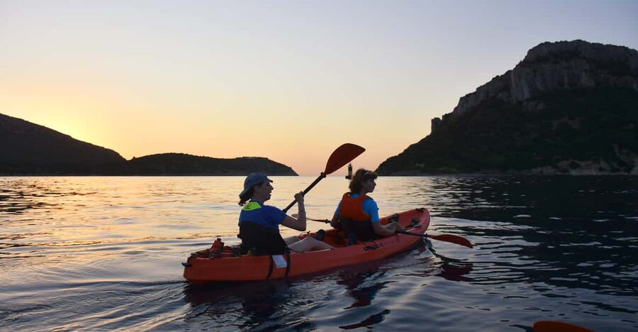 Golfo Aranci: Sunrise Dolphin Kayak Tour with Breakfast - Finding the small beach at Spiaggia dei Baracconi