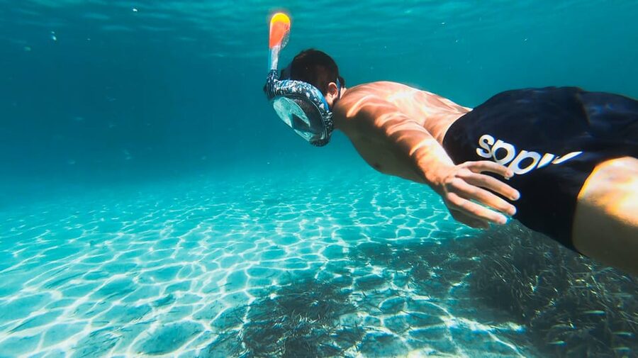 Golfo Aranci: Sunset Dolphin Kayak Tour with Aperitif - Key points at a glance