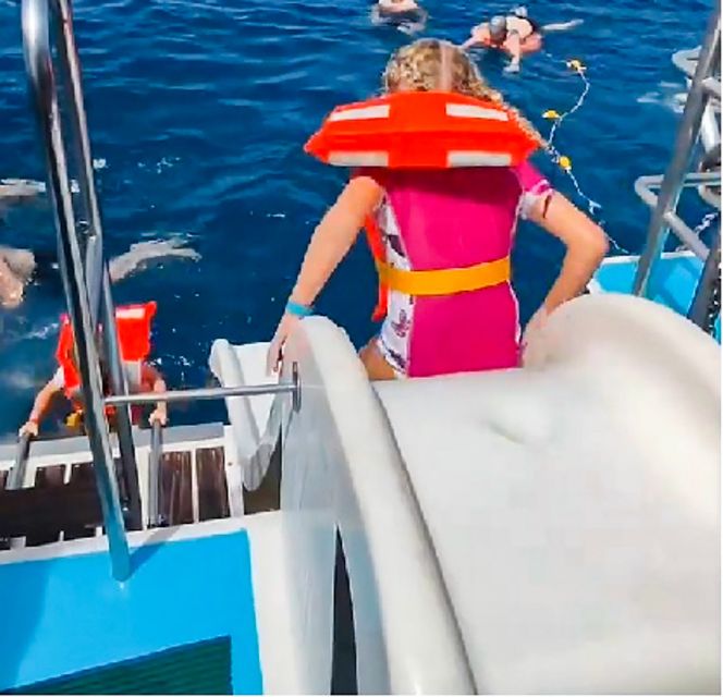 Gran Canaria: Catamaran Dolphin Watch Cruise with Snorkeling - The coastal swim stop near Taurito