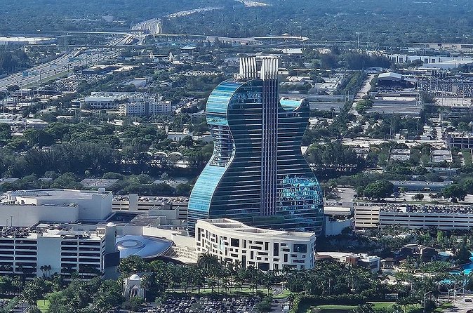 Guitar Hotel or Miami Dolphins Stadium Helicopter Tour - Who will enjoy this flight most?