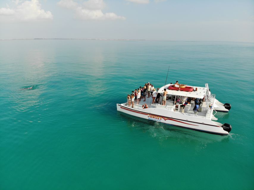 Key West: Dolphin Watching and Snorkeling Sunset Cruise - What the crew adds to the day