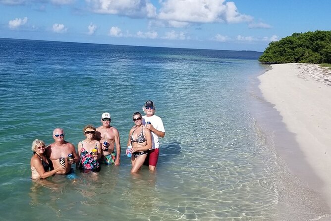 Key West: Snorkel, Sandbar & Dolphin Excursion - Setting out through the Florida Keys National Marine Sanctuary