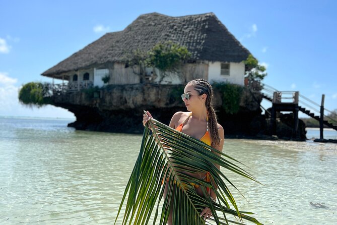 Luxury Tour to DOLPHINS, KUZA CAVE and THE ROCK RESTAURANT - What the dolphin and snorkeling stop is really like