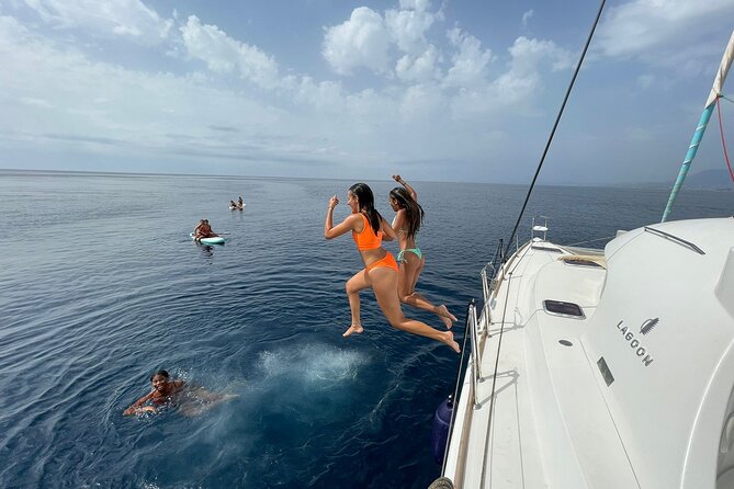 Marbella 2 - hour Catamaran Group Excursion with Dolphin Watching - The swimming stop and water equipment