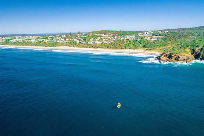 Noosa Ocean adventure & Dolphin Safari. - Passing Main Beach and the Headlands
