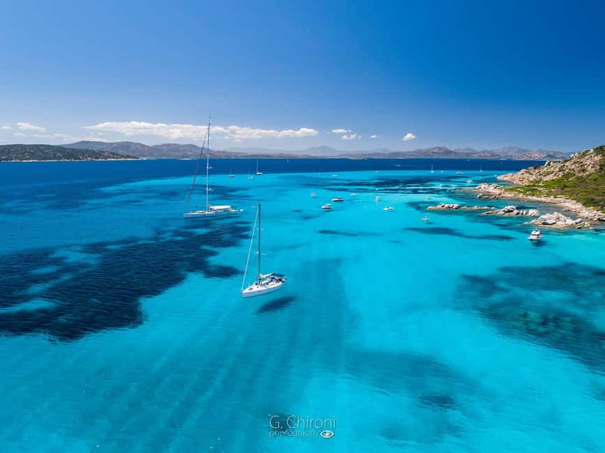 Olbia: Dolphin Watching & Snorkeling Boat Tour near Figarolo - Cala Moresca: swimming, snacks, and a slower hour