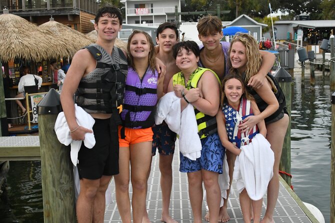 Private Banana Boat and Dolphin Spotting Experience - Watching for dolphins along the route