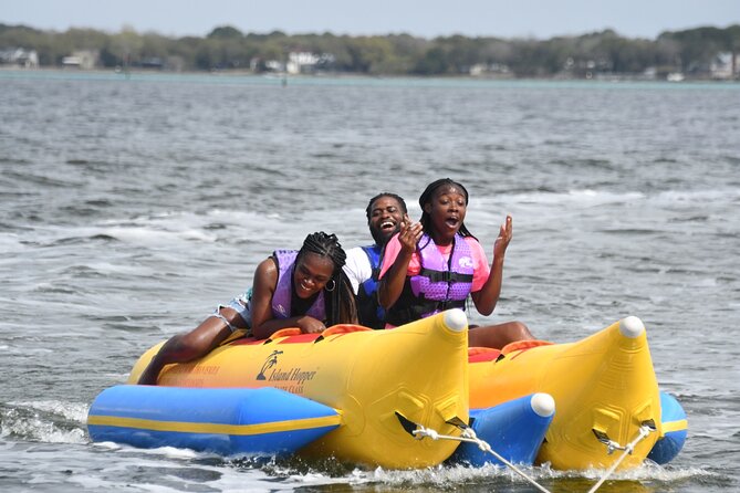 Private Banana Boat and Dolphin Spotting Experience - Handling photos, tips, and extra requests