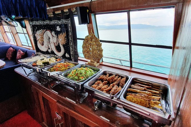 Private Full-Day Red Dragon Yacht for Snorkeling Koh Tan & Visit Pink Dolphin - The Five Islands and the white-gold trade