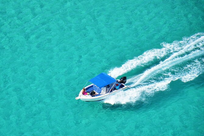 Private Speed Boat Tour and Dolphin Encounter at Ile aux Benitier - Crystal Rock and the view toward Le Morne