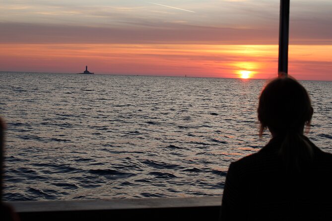 Private Sunset Dolphin Excursion with Dinner and Animation - The lighthouse and a short piece of history