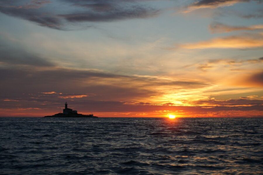 Rovinj: Sunset Boat Trip with Dolphin Watching - Leaving Valdibora as Rovinj Changes Shape