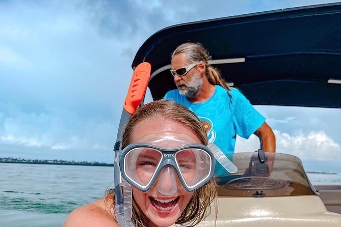 Shell Island Dolphin and Snorkel Boat Tour - Practical ways to enjoy the boat ride