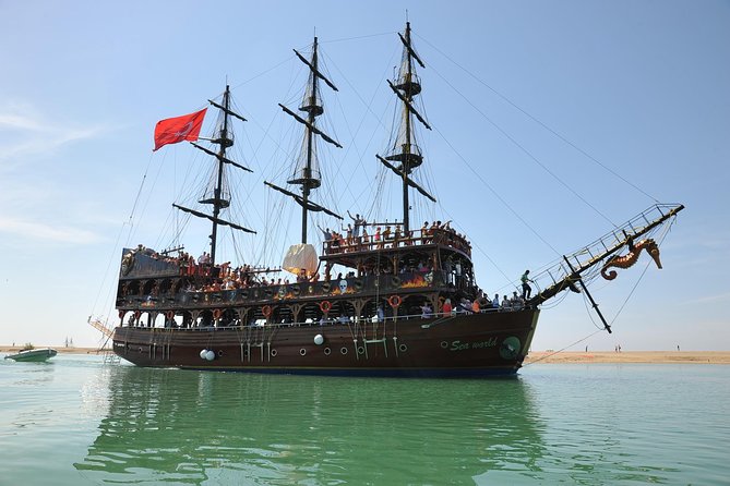 "Side: Boat Adventure to Dolphin Island – Swim and Enjoy Lunch" - Swimming and snorkeling from the anchored boat