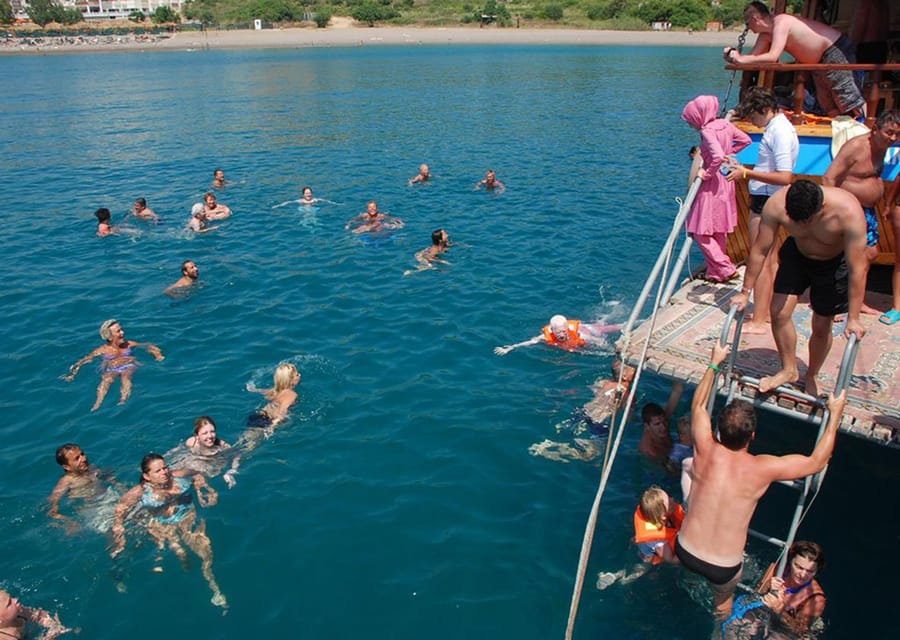 Side: Dolphin Boat Tour With Lunch Foam party Swimming - Karaburun Bay and the final chance to swim