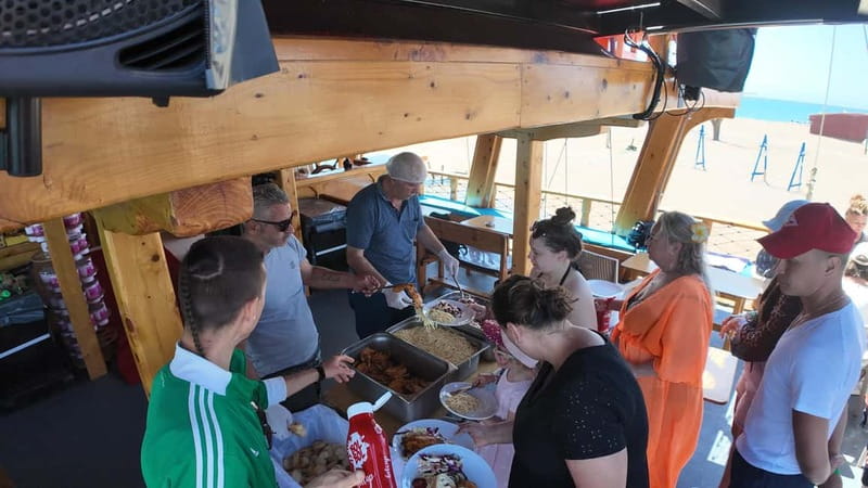 Side: Dolphin Boat Tour With Lunch Foam party Swimming - The Manavgat Strait mixes river and sea views
