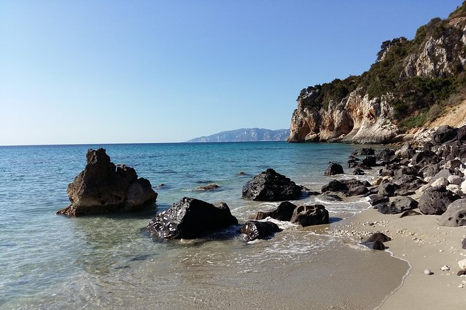 Snorkeling Experience to discover the dolphin inside you! - Reaching a characteristic Sardinian beach