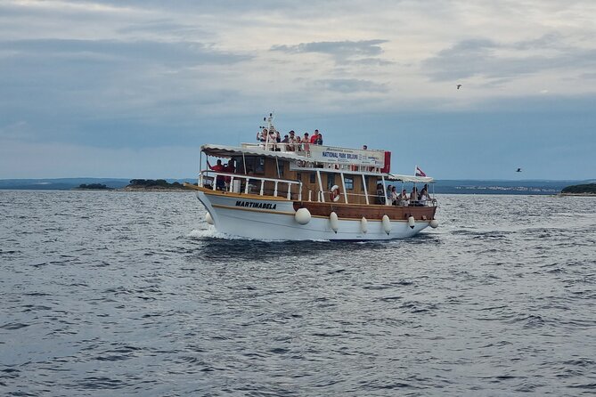 Sunset Dolphin Cruise in Brijuni National Park from Pula - Leaving Pula with Roman stones behind you
