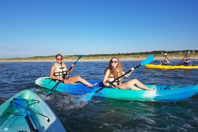 Sunset Dolphin Kayak Tours - Cape Henry lighthouses add history to the outing